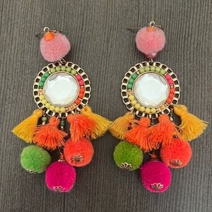 Dangle colorful earrings with tassels and pom poms
